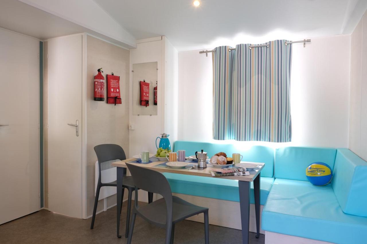 Happy Camp Mobile Homes In Village La Masseria Camping 4*